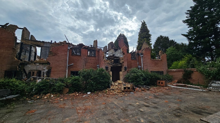 The burned down The Court building