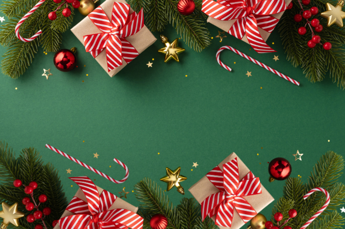 green background bordered by candy canes, wrapped presents, baubles and evergreen branches
