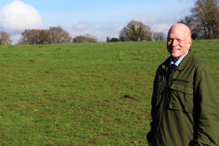 Cllr Stephen Giles-Medhurst, Leader of the Council, standing on green belt land not part of the Local Plan