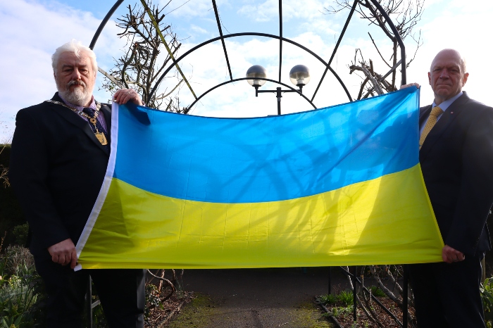 Cllr Stephen King, Chair, and Cllr Stephen Giles-Medhurst, Leader, holding the Ukraine flag