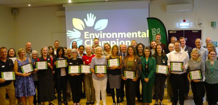 All the winners with their awards at front with a mix of councillors